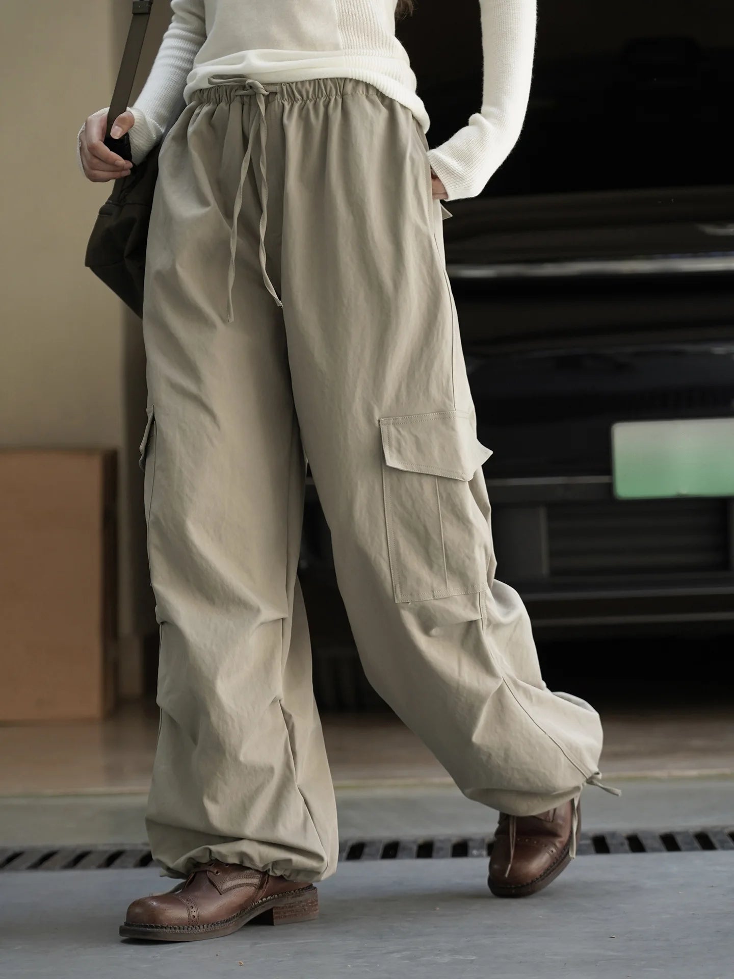 American street workwear style elastic drawstring casual pants with pocket pleats, slightly rolled edge length pants for women