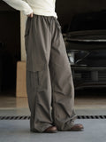 American street workwear style elastic drawstring casual pants with pocket pleats, slightly rolled edge length pants for women