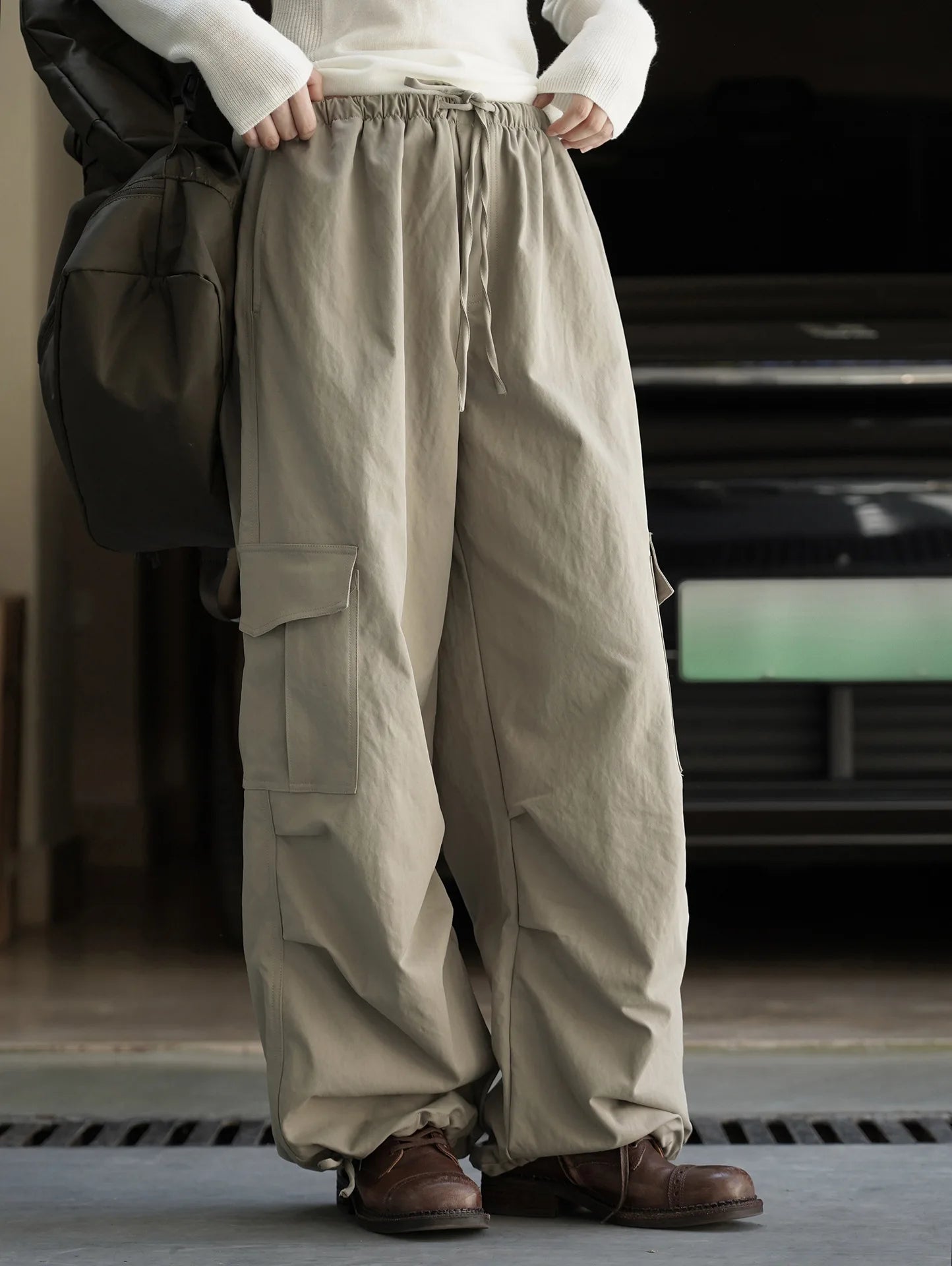 American street workwear style elastic drawstring casual pants with pocket pleats, slightly rolled edge length pants for women